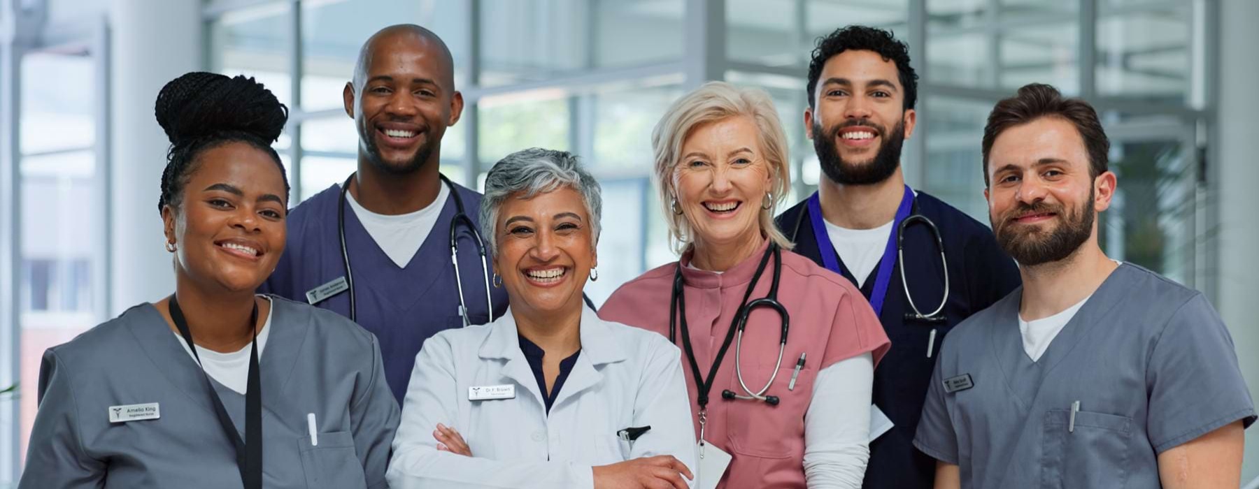 doctors smiling in a bright lit room